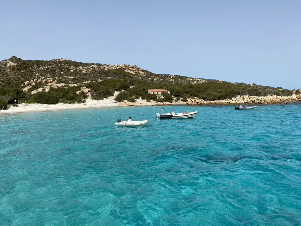 Turquoise waters and pristine white beaches of Sardinia.
